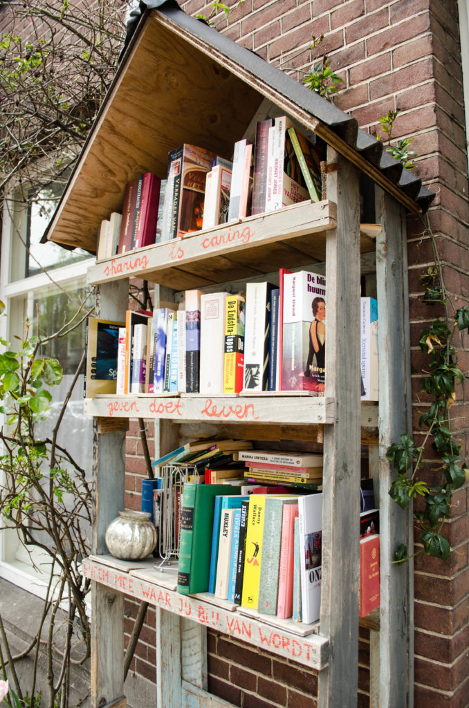 sharing is caring; this tiny free public library in Amsterdam encourages neighbors to share and connect over books