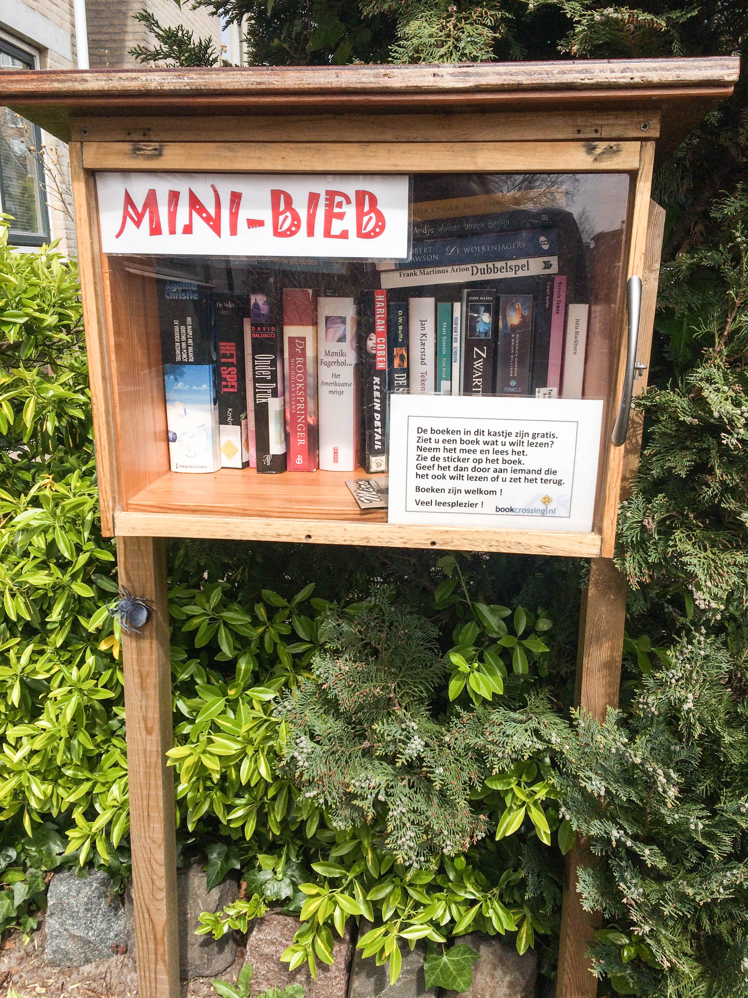a mini-bieb is a tiny free public library full of books in English and Dutch for neighbors to share and enjoy; these can be found all over in Amsterdam