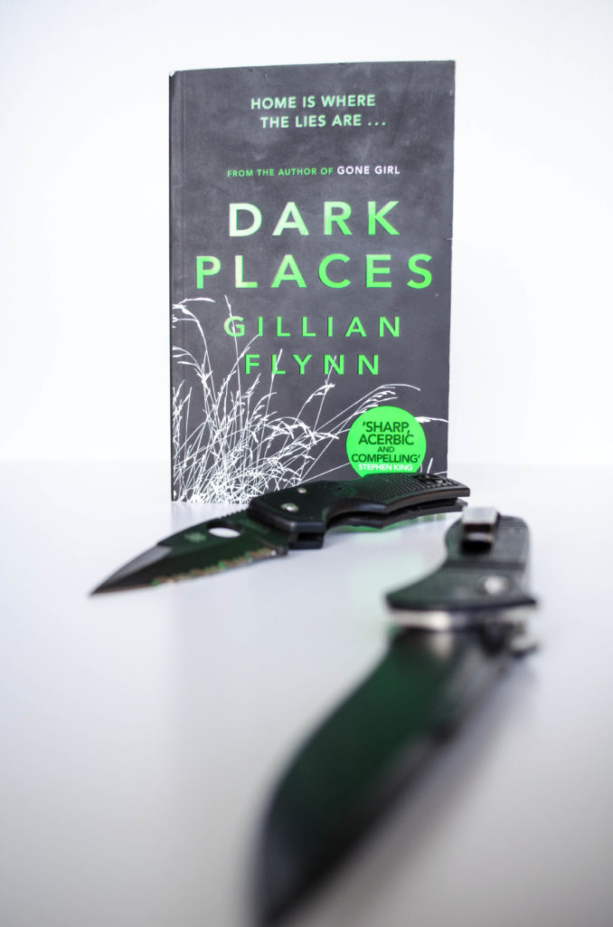 the knives reflect the unsettling creepiness of Gillian Flynn's novel Dark Places