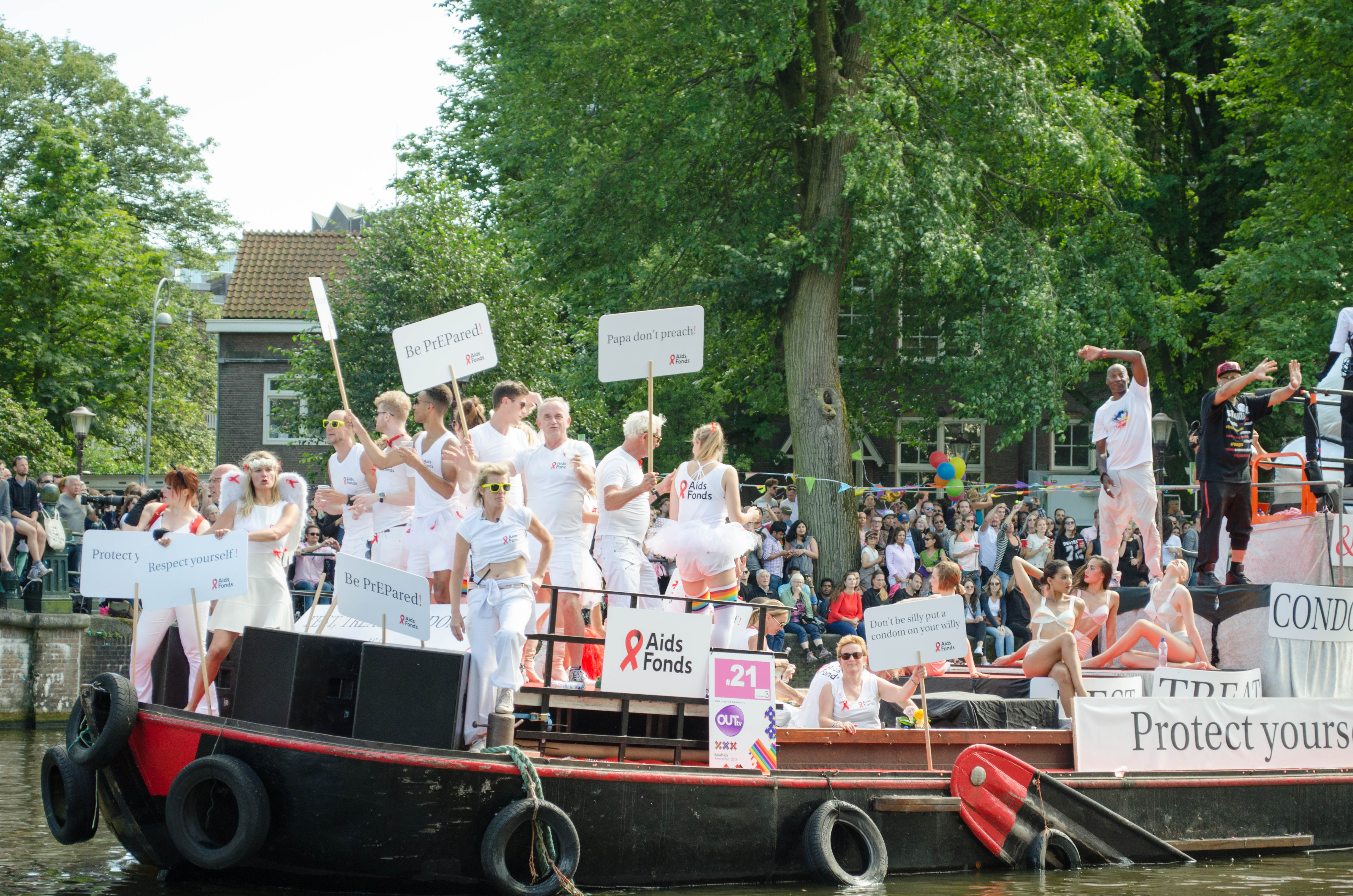 The GGD boat during the 2016 Pride Parade in Amsterdam, advocating for PrEP and the AIDS Fonds